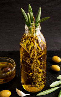 High angle view of fruits in glass jar on table