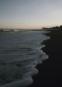 Scenic view of sea against sky at sunset