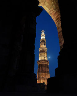 Low angle view of historical building against sky at night