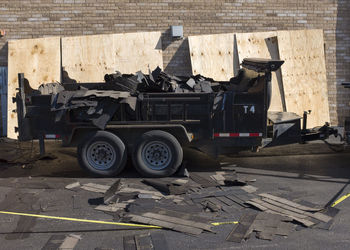 Stack of garbage at construction site in city