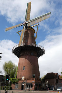 Low angle view of windmill against sky in utrecht, the netherlands 