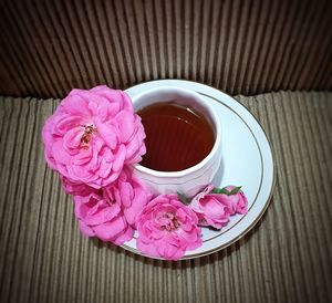 High angle view of pink roses on table