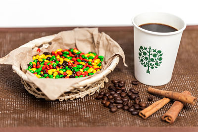 Close-up of coffee beans on table