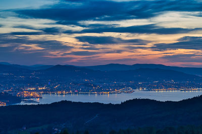 Scenic view of vigo and its port against sky at dusk