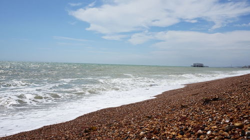 Scenic view of beach against sky