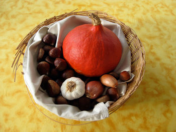 High angle view of fruits in basket on table