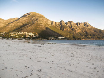 Scenic view of beach against clear sky