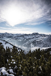 Scenic view of snowcapped mountains against sky