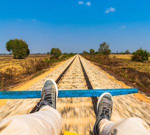 Low section of person on railroad track