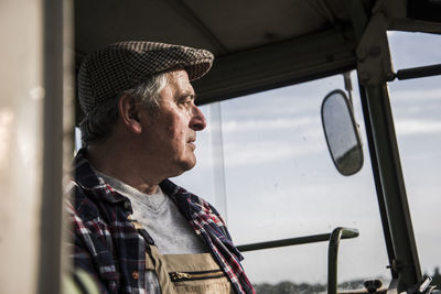 Portrait of farmer on tractor