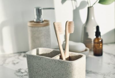 Close-up of paintbrushes on table