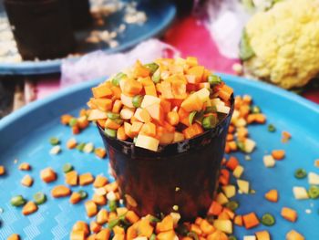 Close-up of chopped vegetables in bowl on table