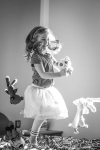 Rear view of girl with dog