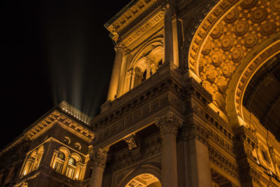 Low angle view of illuminated building at night