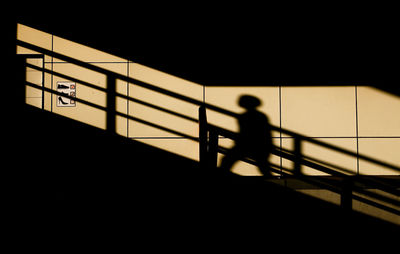 Silhouette people walking in airport