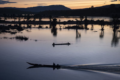 Scenic view of lake during sunset