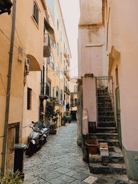 Narrow alley amidst buildings in town