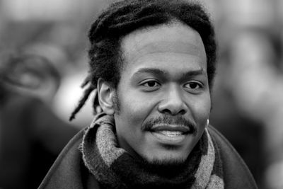 Close-up portrait of smiling young man