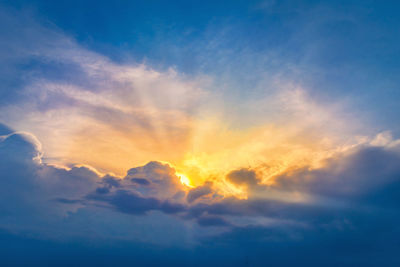 Low angle view of clouds in sky during sunset