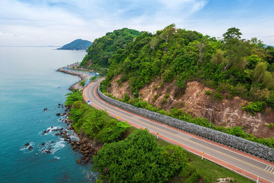 High angle view of road by sea against sky