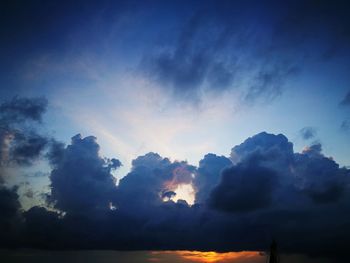 Low angle view of dramatic sky during sunset