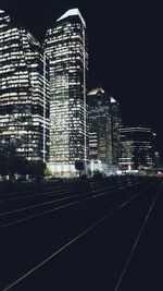 Modern buildings in city at night