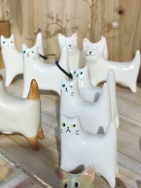 Close-up of white animal representation on table