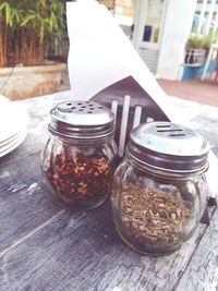 Close-up of wine in jar on table