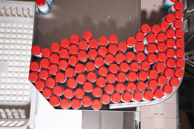 High angle view of red candies in container