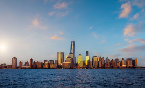 Modern buildings in city against sky