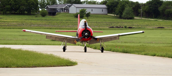 Rear view of man standing on field