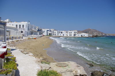 Scenic view of beach against clear sky