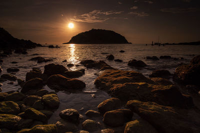 Scenic view of sea against sky during sunset