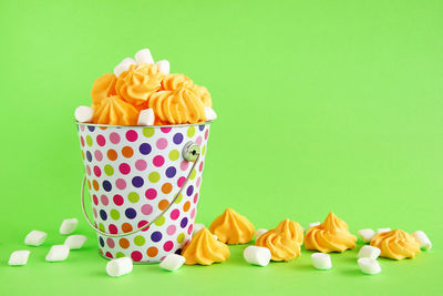 Close-up of multi colored candies on table
