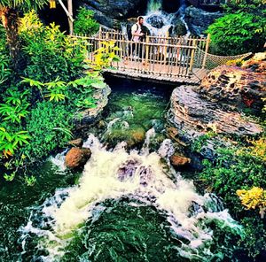 Scenic view of river flowing through rocks