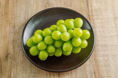 High angle view of fruits in bowl on table