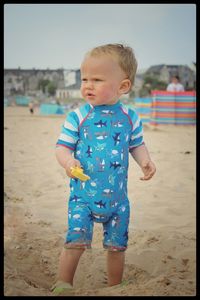 Full length of boy on beach