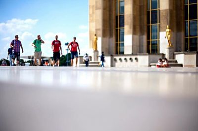 Group of people in front of building