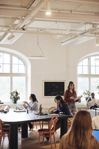 Business colleagues working together at coworking office