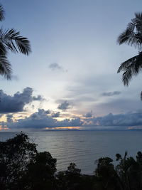 Scenic view of sea against sky at sunset