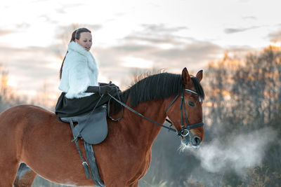 Man riding horse