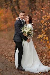 Portrait of bride holding bouquet