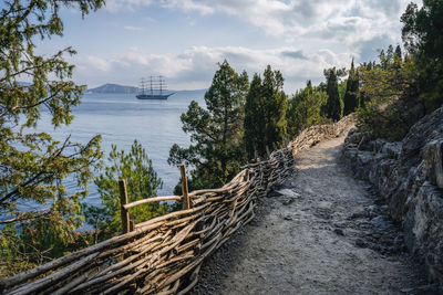 View of the sea bay and ship in the village novyi svit in the crimea in autumn