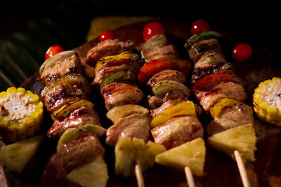 Close-up of meat and vegetable on barbecue grill