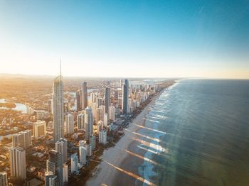 Aerial view of modern buildings against clear sky