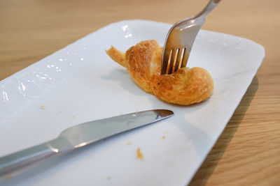 High angle view of bread in plate on table