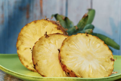 Close-up of lemon slice in plate