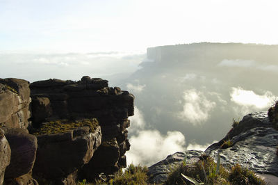 Panoramic view of landscape against cloudy sky