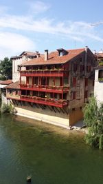 View of canal with buildings in background