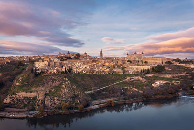 Panoramic view of buildings against sky during sunset